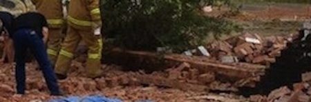 CUB site base of brick wall